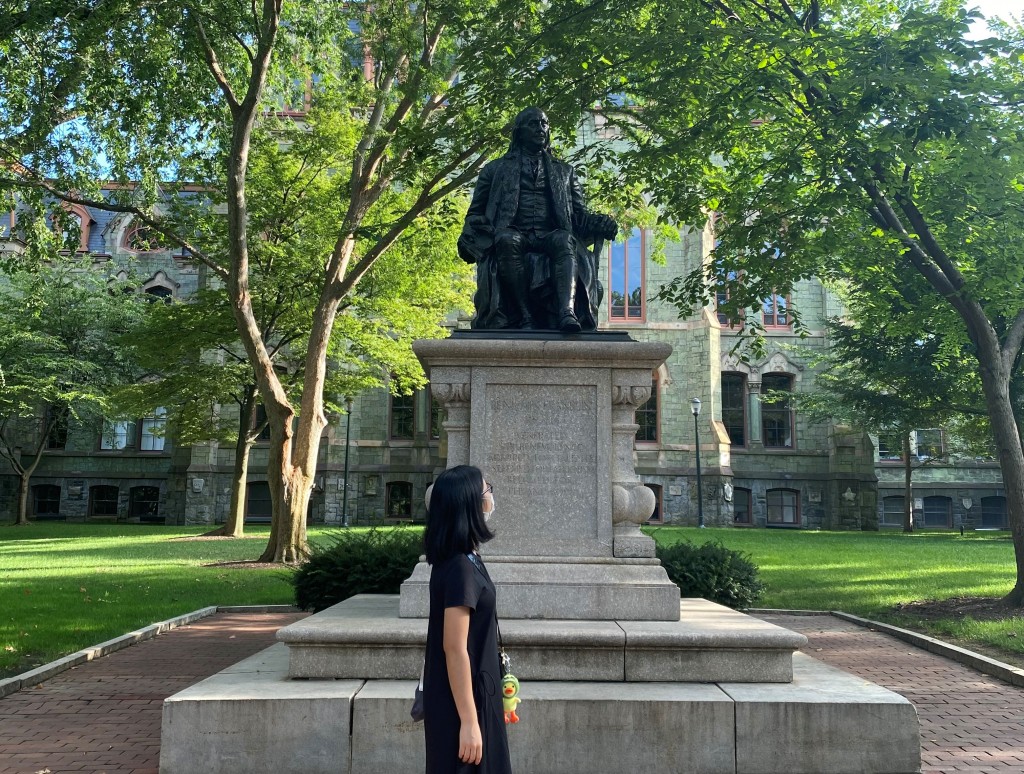 The author, in front of the statue of Benjamin Franklin, one of Penn’s founding fathers, on her very first visit to the university